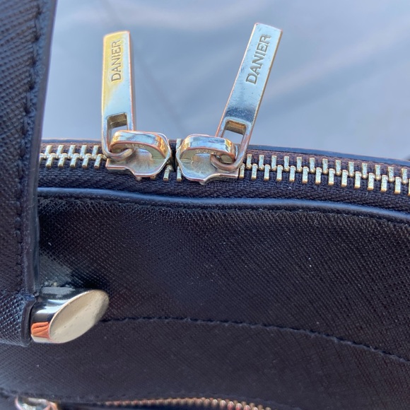 Danier black leather handbag with shiny gold colored accents - Picture 4 of 14